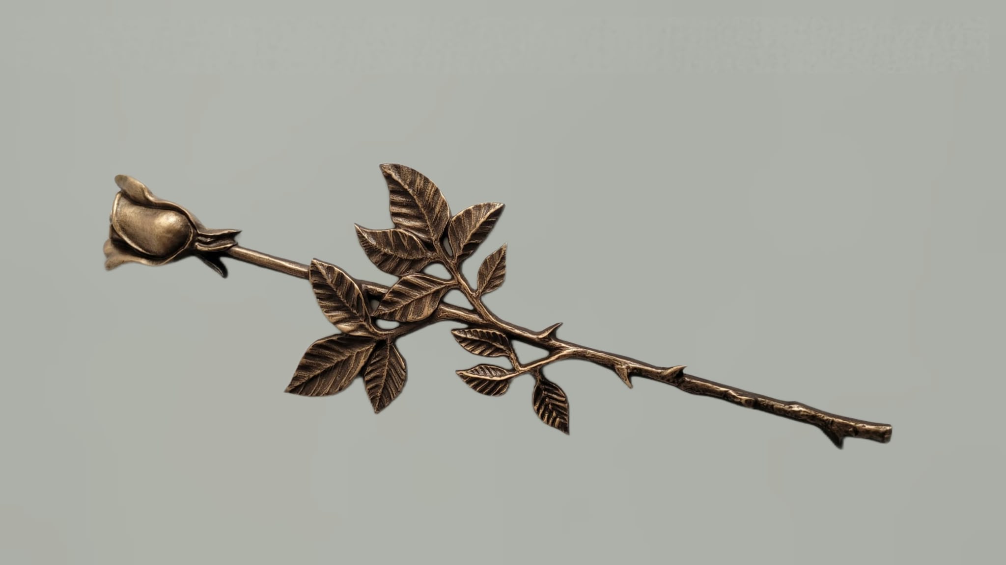 Rosenzweig mit 1 Blüte, Bronze